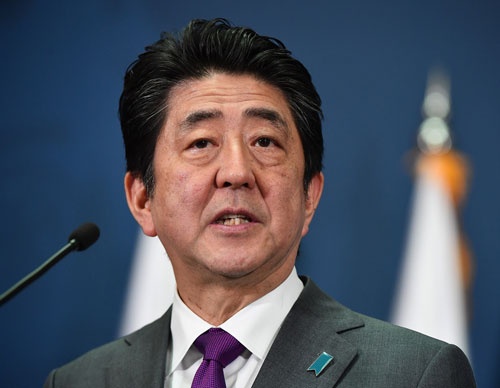 安倍首相の答弁で法案の問題点に再び注目が集まるようになった(写真: PA Photos/amanaimages)