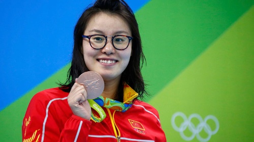 競泳背泳ぎ100㍍で銅メダルをとった傅園慧は新世代の中国選手として注目された（写真：ロイター/アフロ）