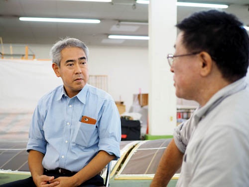 四戸社長(写真左)と松浦氏