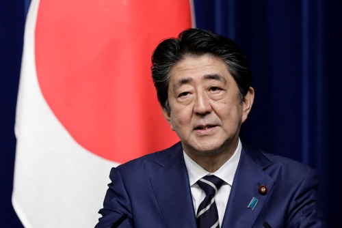安倍首相は外国人労働者の受け入れ拡大に積極的 (写真:代表撮影/ロイター/アフロ)