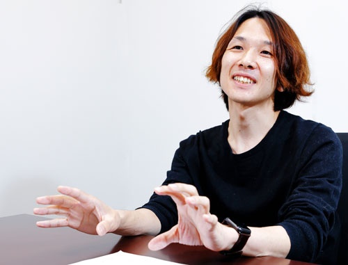 大澤氏は2歳のときからドラえもんをつくる夢を追い続けている。日本で唯一、「汎用人工知能」をテーマに博士論文を通した（写真＝竹井 俊晴）