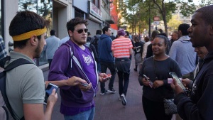 写真9●「Lyft」のプロモーションコードを配る男性