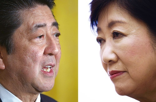 <b>東京五輪を控え、表向き協調姿勢の安倍首相と小池都知事。自民内では支持層を奪われることへの警戒感が強まっている</b>(写真=2点:AFP=時事)