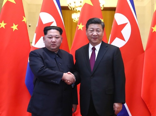 金正恩委員長は3月25―28日、中国を訪問し、習近平国家主席と会談した(写真:新華社/アフロ)