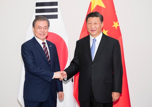 韓国と日米との“不和”は中国にとって良いことばかりではない（写真：新華社/アフロ）