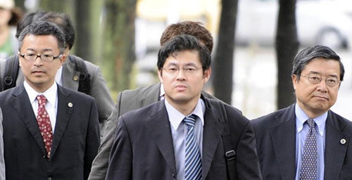 2009年10月、大阪高裁に入る金子氏（写真：共同通信）
