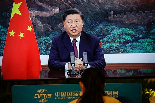 習近平・国家主席はTPP加盟を積極的に検討すると明言していた(写真:ロイター/アフロ)